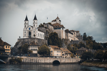 Medieval Aarburg with church on the Aare in the canton of Aargau in Switzerland