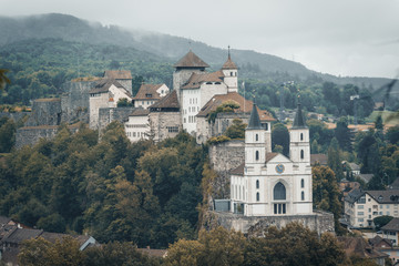 Fototapeta na wymiar Medieval Aarburg with church on the Aare in the canton of Aargau in Switzerland