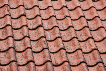 Facade of a building with rectangular windows with reflections