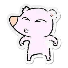 distressed sticker of a cartoon whistling bear