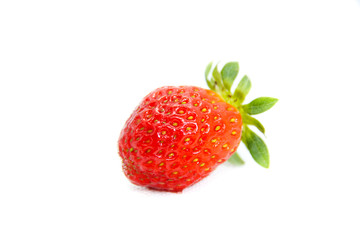 One red strawberry with leaves on white background