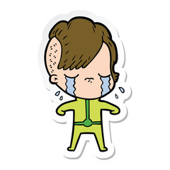 sticker of a cartoon crying girl