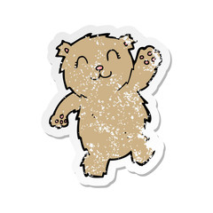retro distressed sticker of a cartoon waving teddy bear