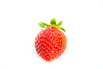 One red strawberry with leaves on white background