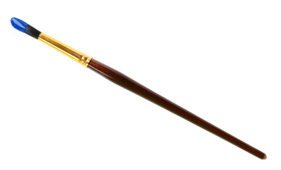 Brush with color paint on white background, top view