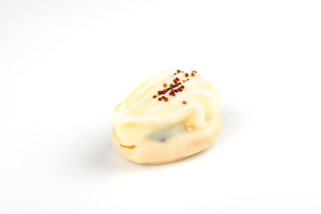 Mini yellow cakes on white background