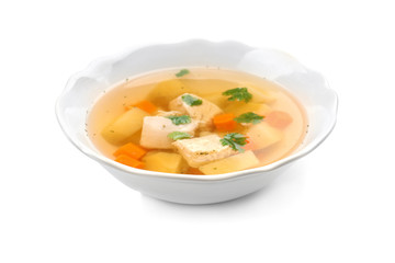 Dish with fresh homemade chicken soup on white background