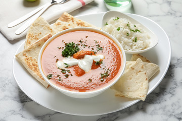 Delicious butter chicken served on table. Traditional Murgh Makhani dish