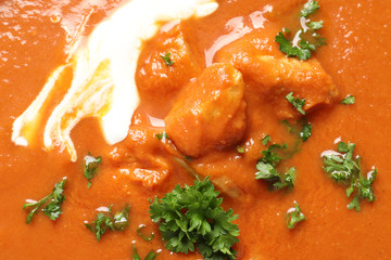 Delicious butter chicken as background, closeup. Traditional Murgh Makhani dish