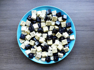 Black and white computer keyboard keys on the plate. Concept of unstructured big data that need to...