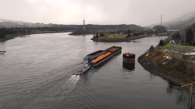 Grain Filled Barge Pushing Up the Columbia River to Bonneville