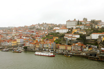 Fototapeta na wymiar Panoramic view of old Porto Oporto city and Ribeira over Douro river from Vila Nova de Gaia, Portugal