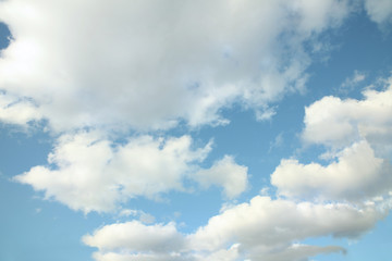 Naklejka na ściany i meble Natural blue sky with white clouds