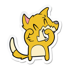 sticker of a laughing fox cartoon