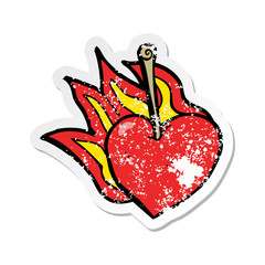 retro distressed sticker of a cartoon flaming heart cherry © lineartestpilot