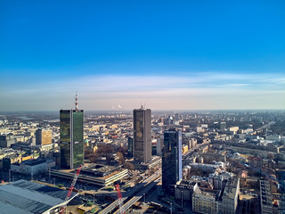 WARSAW, POLAND - FEBRUARY 23, 2019: Beautiful panoramic aerial drone view to the center of Warsaw City and hotel Marriott and railway station Warszawa Centralna