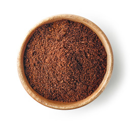 wooden bowl of ground coffee