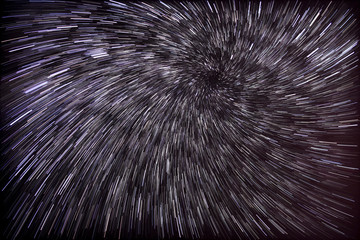 Circumpolar vortex startrail. Sky with stars.