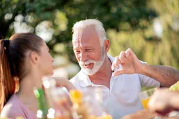 Obraz premium Family lunch in garden