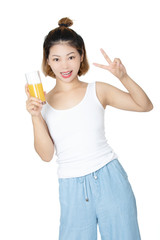 Chinese woman drinking orange juice isolated on white background