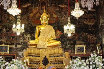 Ornate golden Buddha statue at Wat Arun Bangkok Thailand 