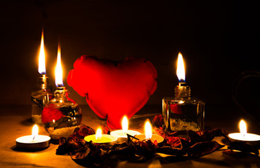 Beautiful candles and gifts burning on Valentine's Day