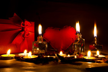 Beautiful candles and gifts burning on Valentine's Day
