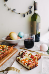 Homemade pie ( quiche) with ricotta, fresh colored tomatoes