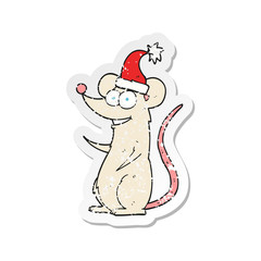 retro distressed sticker of a cartoon mouse wearing christmas hat