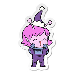 sticker cartoon of a alien girl giggling wearing santa hat