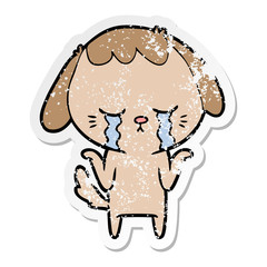 distressed sticker of a cartoon crying dog