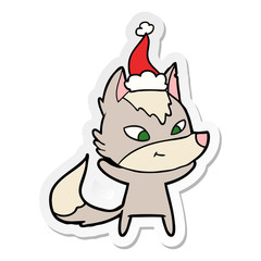 friendly sticker cartoon of a wolf wearing santa hat