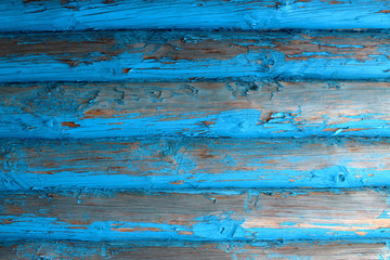 Blue wooden logs. Close-up. Horizontal view. Background. Texture.