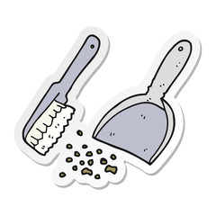 sticker of a cartoon dustpan and brush