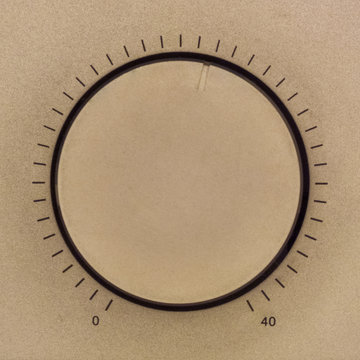 Minimalist volume control knob of vintage hi-fi amplifier