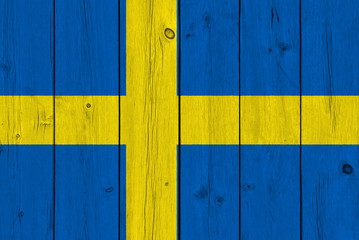 Sweden flag painted on old wood plank