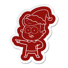 cartoon  sticker of a staring man wearing santa hat