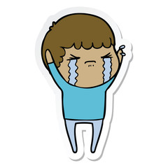 sticker of a cartoon man crying