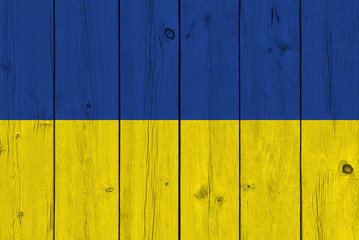 Ukraine flag painted on old wood plank