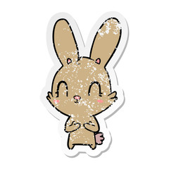 Obraz premium distressed sticker of a cute cartoon rabbit