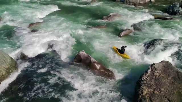 Aerial of Kayaker on Level 5 Rapids