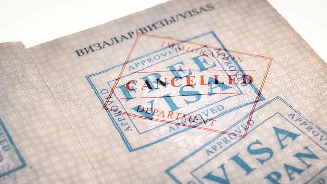 put a stamp in the passport: Free visa, canceled