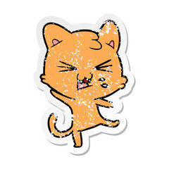 distressed sticker of a cartoon hissing cat
