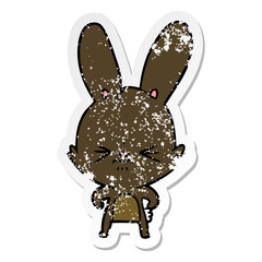 distressed sticker of a cute cartoon rabbit