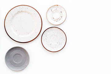 Mockup with plates. Empty ceramic plates on white background top view space for text