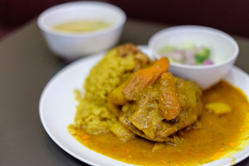 Muslim yellow rice with chicken