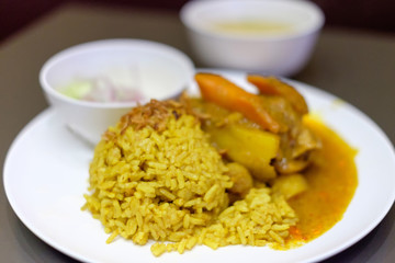 Muslim yellow rice with chicken