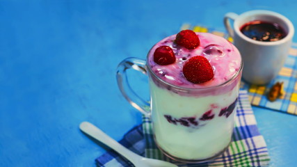 milk yogurt with berry jam.  frozen cherries.