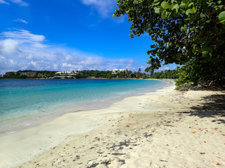 St. Thomas beach in the US Virgin Island with beautiful blue sky and clear turquoise water.