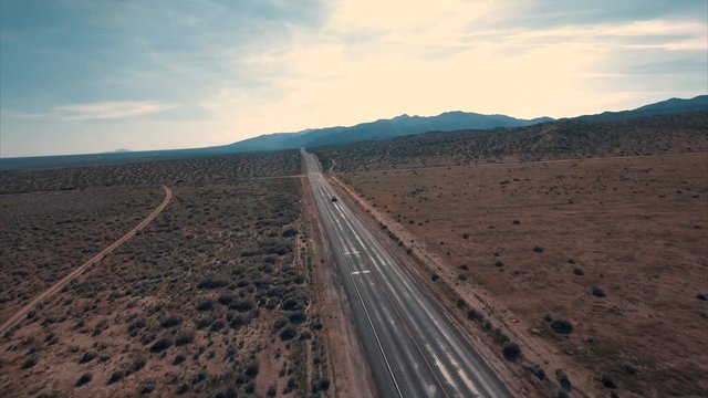 Above the road, aerial shot of the desert, 4k